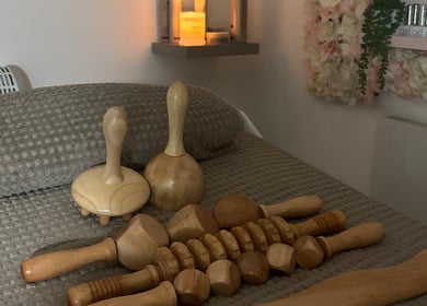 A serene spa setting at Skin Love Era, Maidstone, England, GB, showcasing elegant wooden massage tools.
