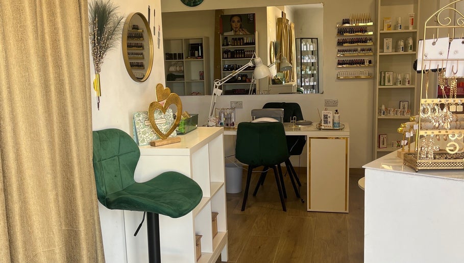 Elegant interior of Denise Makeup Artist & Beauty Therapist in Iż-żejtun, MT with makeup and skincare displays.
