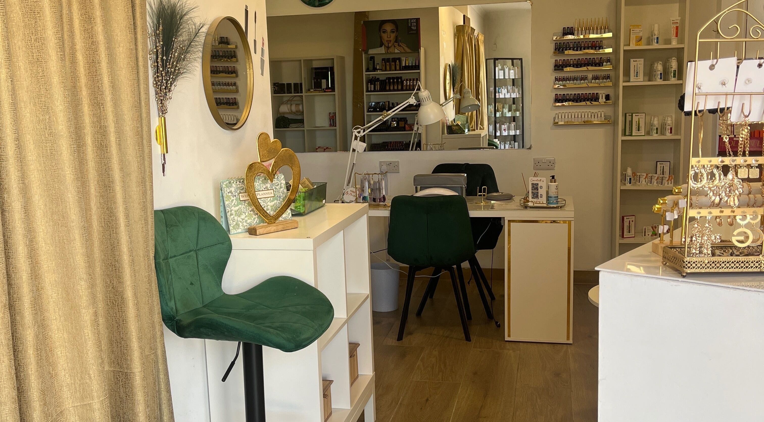 Elegant interior of Denise Makeup Artist & Beauty Therapist in Iż-żejtun, MT with makeup and skincare displays.