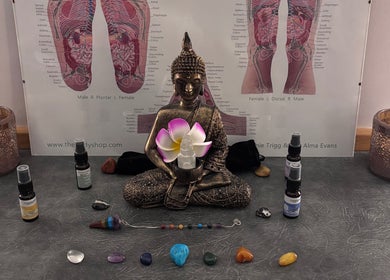 Buddha statue with crystals at Just Breathe - CT Holistic Health & Wellness, Newton Abbot, England, GB.