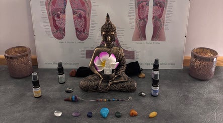 Buddha statue with crystals at Just Breathe - CT Holistic Health & Wellness, Newton Abbot, England, GB.