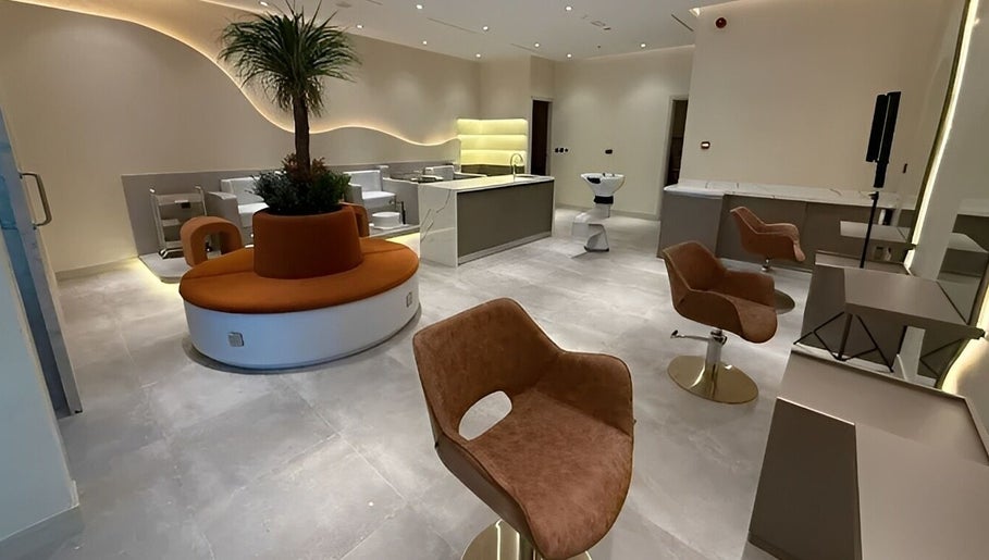 Interior of Look & Love Beauty Salon in Dubai, Dubai, AE, featuring modern decor and seating area.