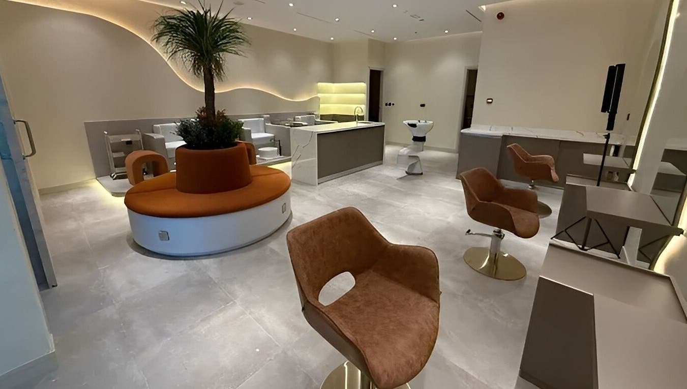 Interior of Look & Love Beauty Salon in Dubai, Dubai, AE, featuring modern decor and seating area.