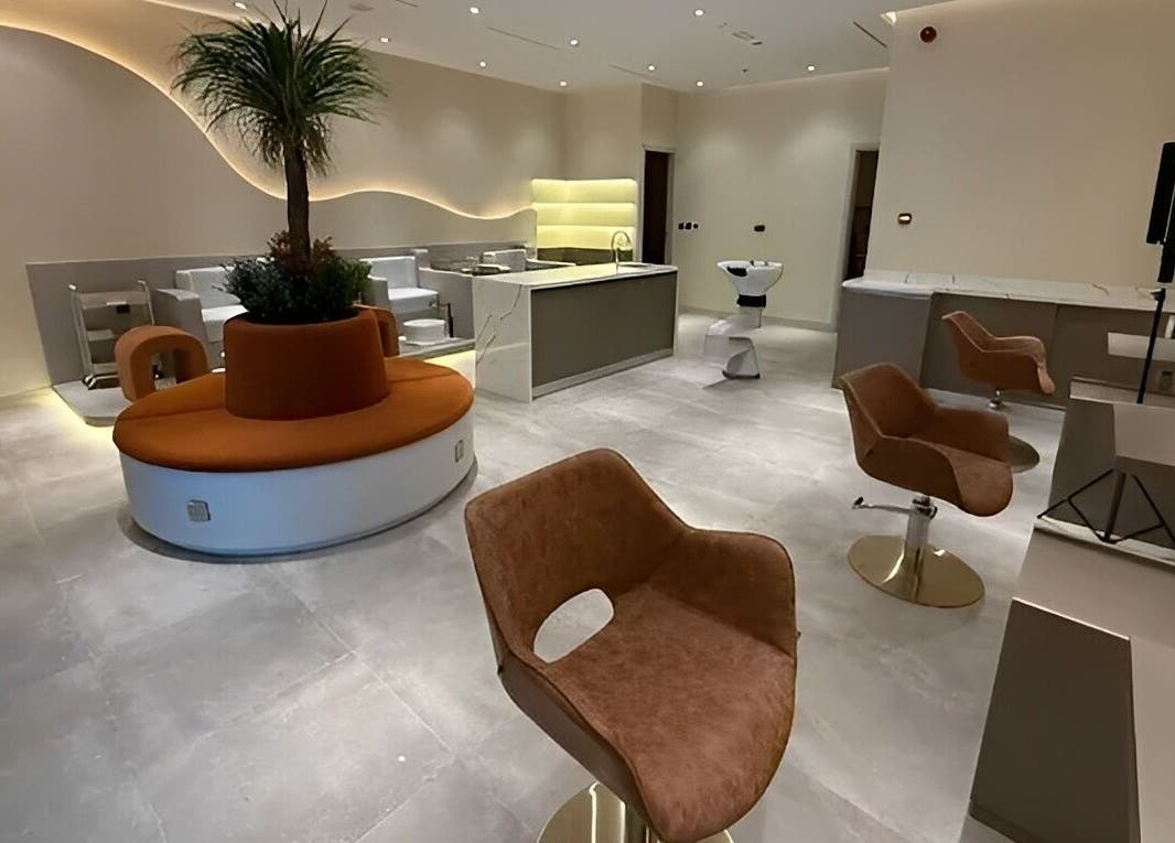 Interior of Look & Love Beauty Salon in Dubai, Dubai, AE, featuring modern decor and seating area.