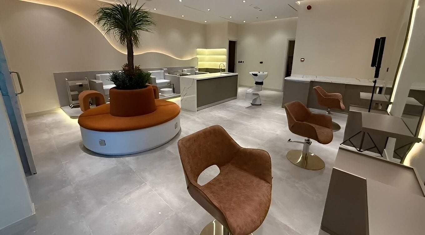 Interior of Look & Love Beauty Salon in Dubai, Dubai, AE, featuring modern decor and seating area.