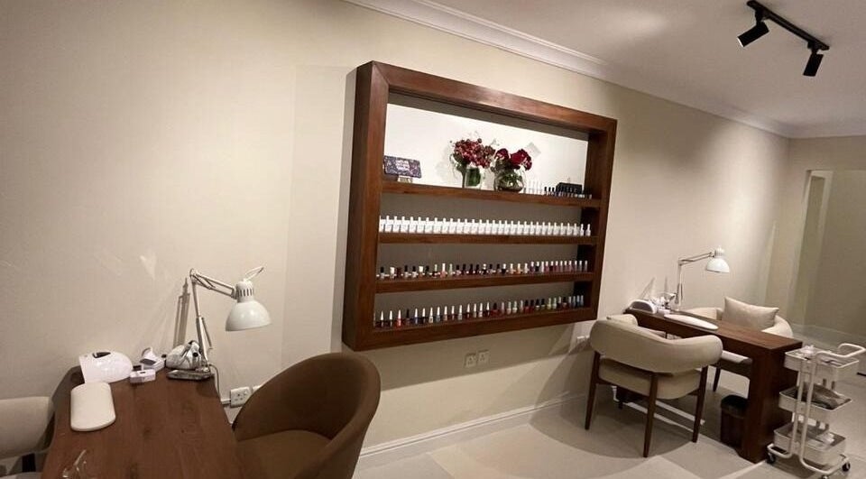 The Really Spa's chic nail area in Riyadh, Riyadh Province, SA, featuring elegant nail polish displays.