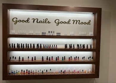 Nail polish display at The Really Spa, Riyadh, showcasing vibrant colors.