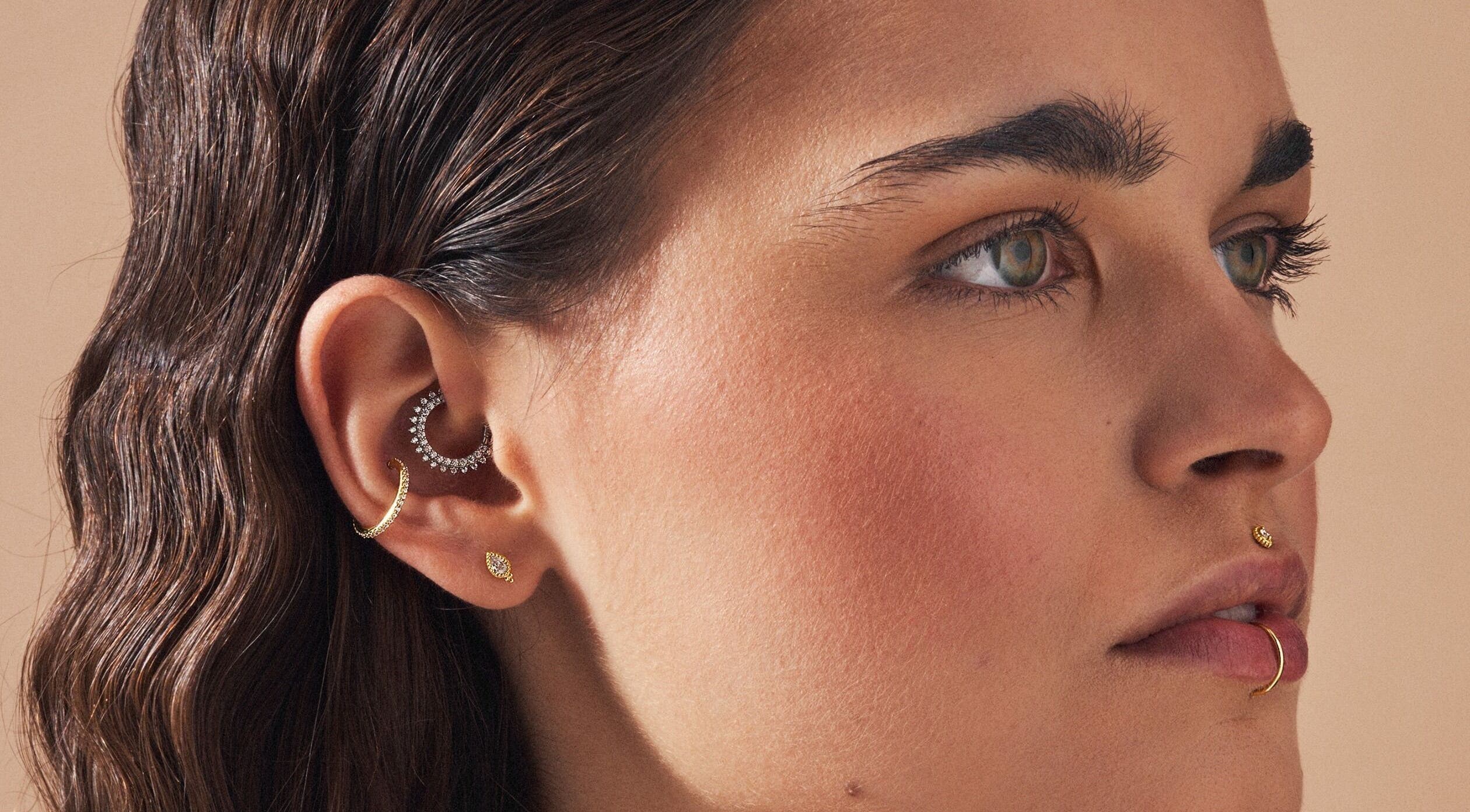Close-up of a person with stylish piercings at Tish Lyon, London, England, GB.