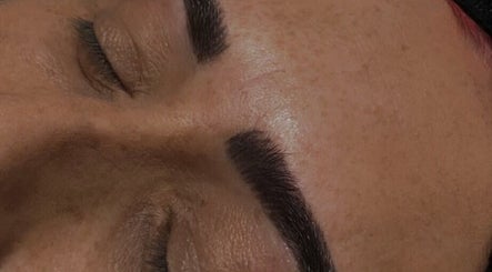 Close-up of expertly shaped eyebrows at Glammed By Loz, Ellesmere Port, England, GB.