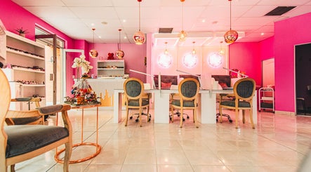 Elegant interior of Harmony Nail and Beauty Irene, Centurion, Gauteng, ZA with modern pink décor and comfortable seating.
