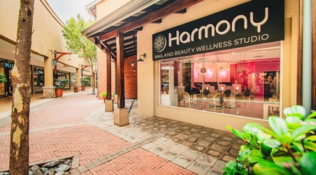 Entrance of Harmony Nail and Beauty Irene at Centurion, Gauteng, ZA with pink interior view.