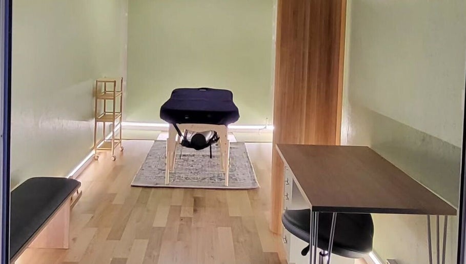 Calming massage room at Spiritfit Massage, Penryn, England, GB with a massage table and serene decor.