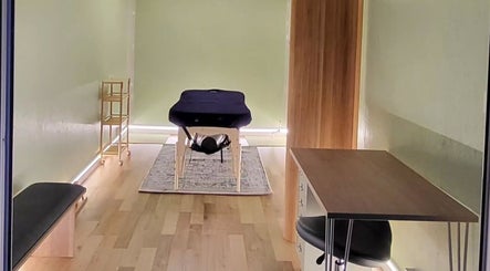 Calming massage room at Spiritfit Massage, Penryn, England, GB with a massage table and serene decor.