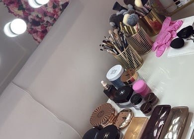 Makeup vanity with brushes and cosmetics at Klaudii Beauty, St Andrews, Scotland, GB.