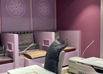 Elegant nail salon seating at Harmony Nail and Beauty Sandton, Sandton, Gauteng, ZA featuring plush decor.