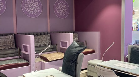 Elegant nail salon seating at Harmony Nail and Beauty Sandton, Sandton, Gauteng, ZA featuring plush decor.