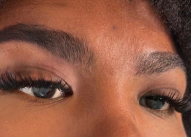 Close-up of styled eyelashes and eyebrows at Mroz Beauty, Salford, England, GB.