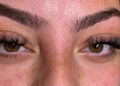 Close-up of defined eyebrows and lashes at Mroz Beauty, Salford, England, GB.