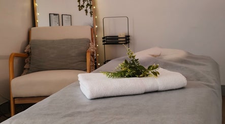 Relaxing massage room at Massage by Laura, Runaway Bay, Queensland, AU with calming decor.