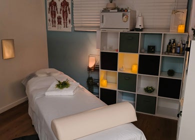Relaxing massage room at Massage by Laura, Runaway Bay, Queensland, AU, featuring calming decor.