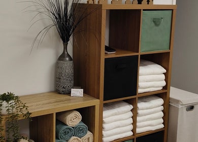 Storage shelves with towels at Massage by Laura in Runaway Bay, Queensland, AU.