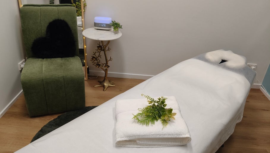 Relaxing massage room with cozy decor at Massage by Laura, Runaway Bay, Queensland, AU.