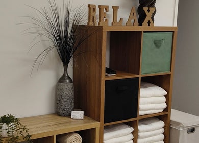 Relaxing decor at Massage by Laura in Runaway Bay, Queensland, AU enhances the calming ambiance.