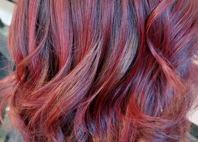 Rich red hair waves styled at Botanical Blade hair studio in Dunedin, Otago Region, NZ.
