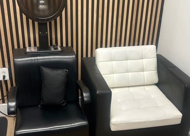 Cozy salon seating at Treasuring Your Crown- Natural Hair in Charlotte, North Carolina, US.