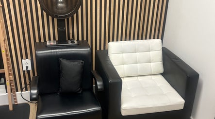 Cozy salon seating at Treasuring Your Crown- Natural Hair in Charlotte, North Carolina, US.