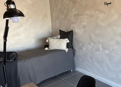 Cozy massage bed at Elegant Touch Beauty in Gqeberha, Eastern Cape, ZA for soothing wellness treatments.