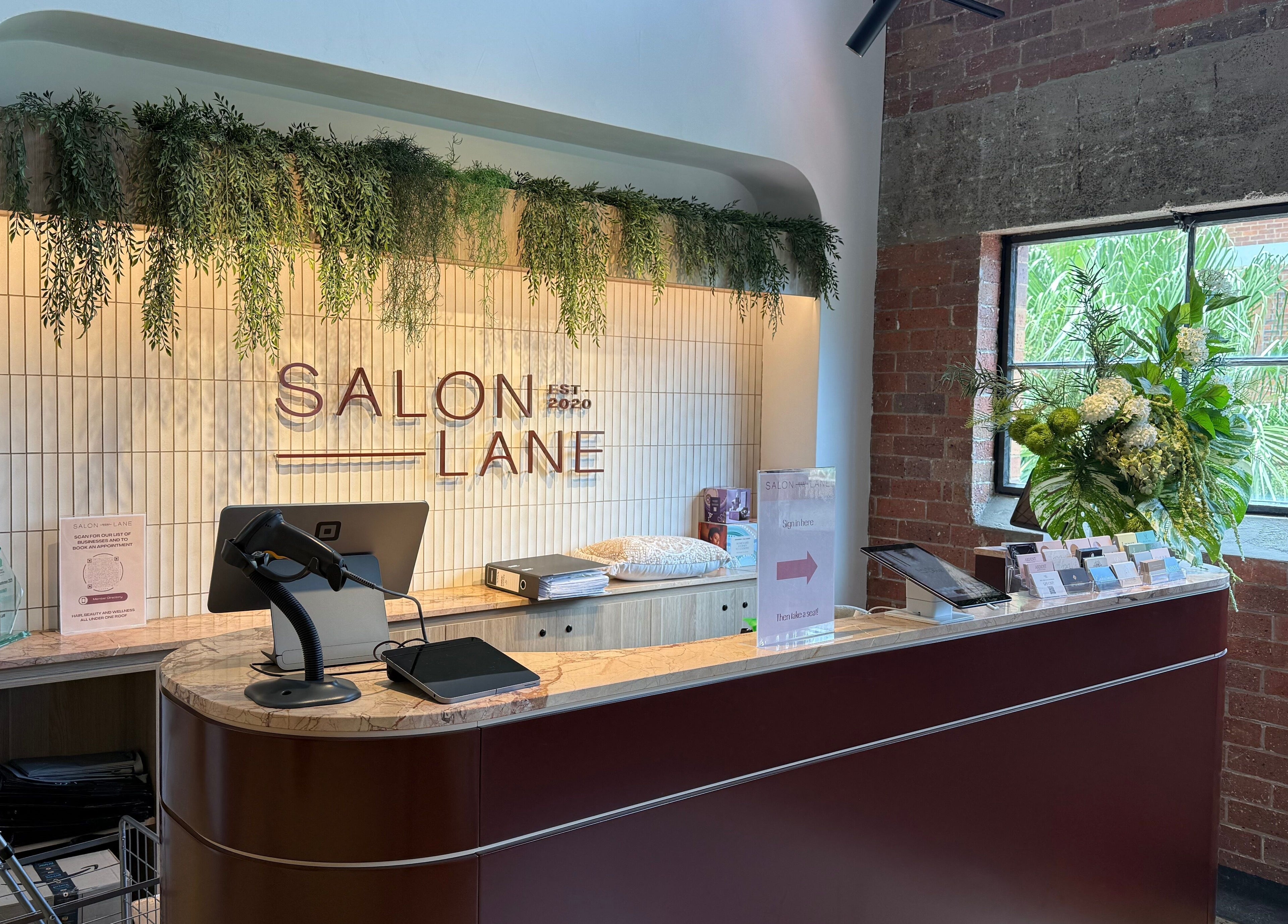 Elegant desk area at Narce with greenery in West End, Queensland, AU. Inviting and stylish interior.