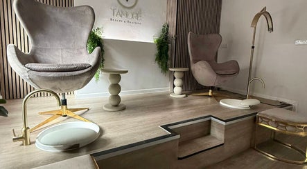Elegant pedicure chairs at Tamoré Beauty in Birmingham, England, GB, offering a serene wellness experience.