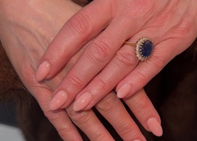 Close-up of a manicured hand with a ring at Esel Beauty, Enfield, England, GB.