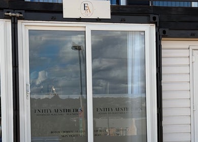 Front view of Entity Aesthetics in Rochester, England, GB showcasing modern glass entrance.
