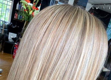 Blonde hair styling at Hoipolloi Studio, Winchester, England, GB. Stylish and modern beauty setting.