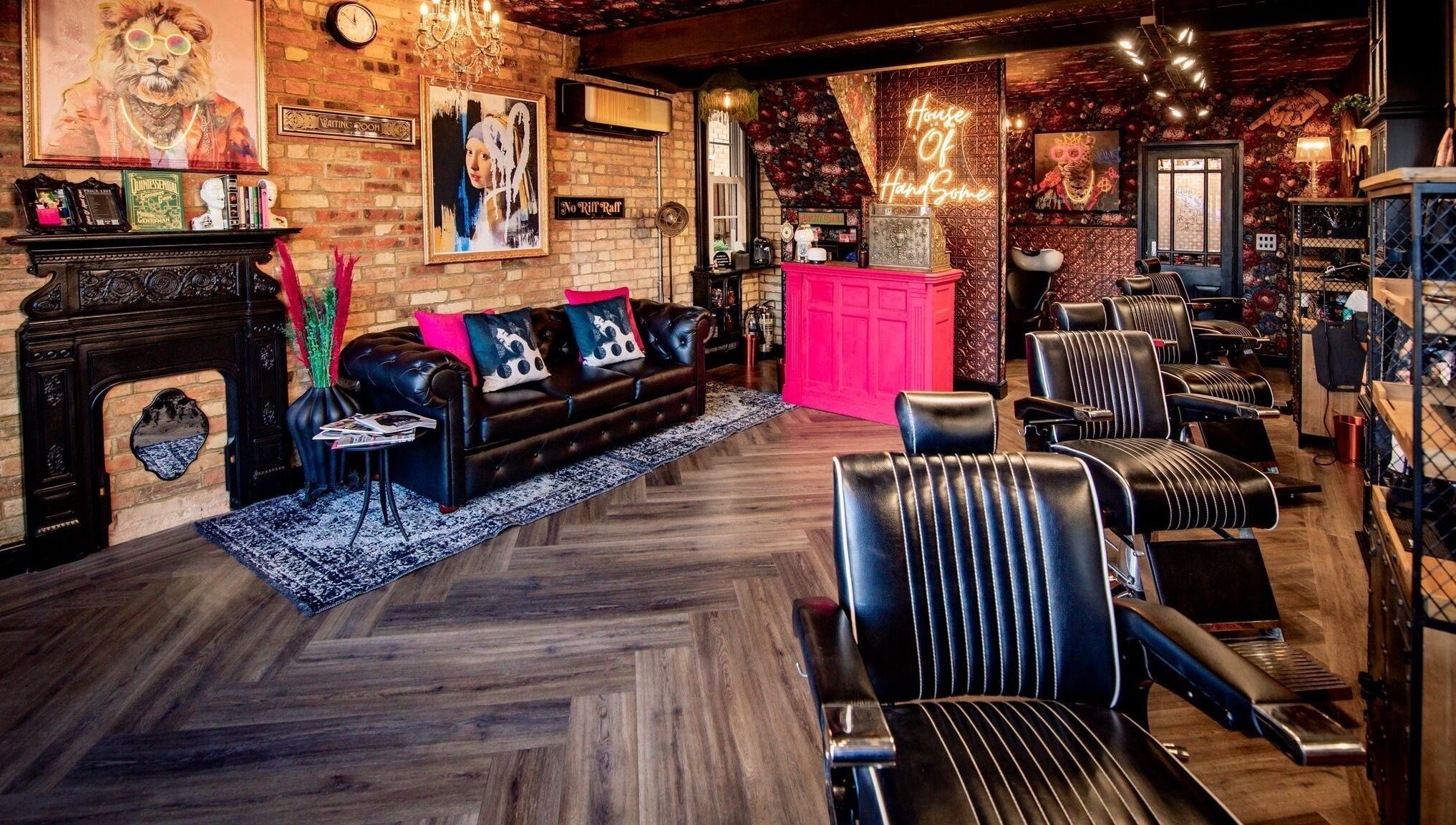 Chic interior of J wavey beauty salon in Kempston, England, GB with elegant decor and barber chairs.