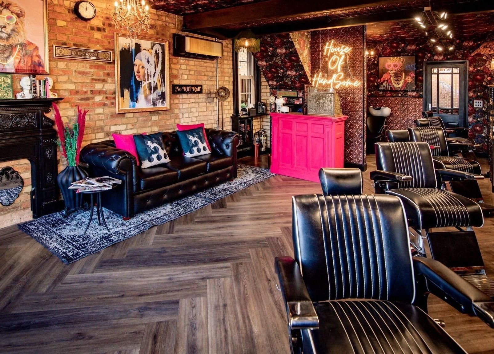 Chic interior of J wavey beauty salon in Kempston, England, GB with elegant decor and barber chairs.