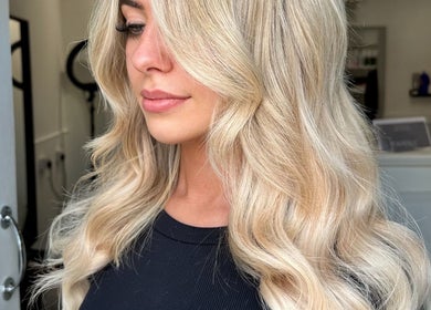 Elegant blonde waves styled at Hair by Tyler Alexandra, Basildon, England, GB.