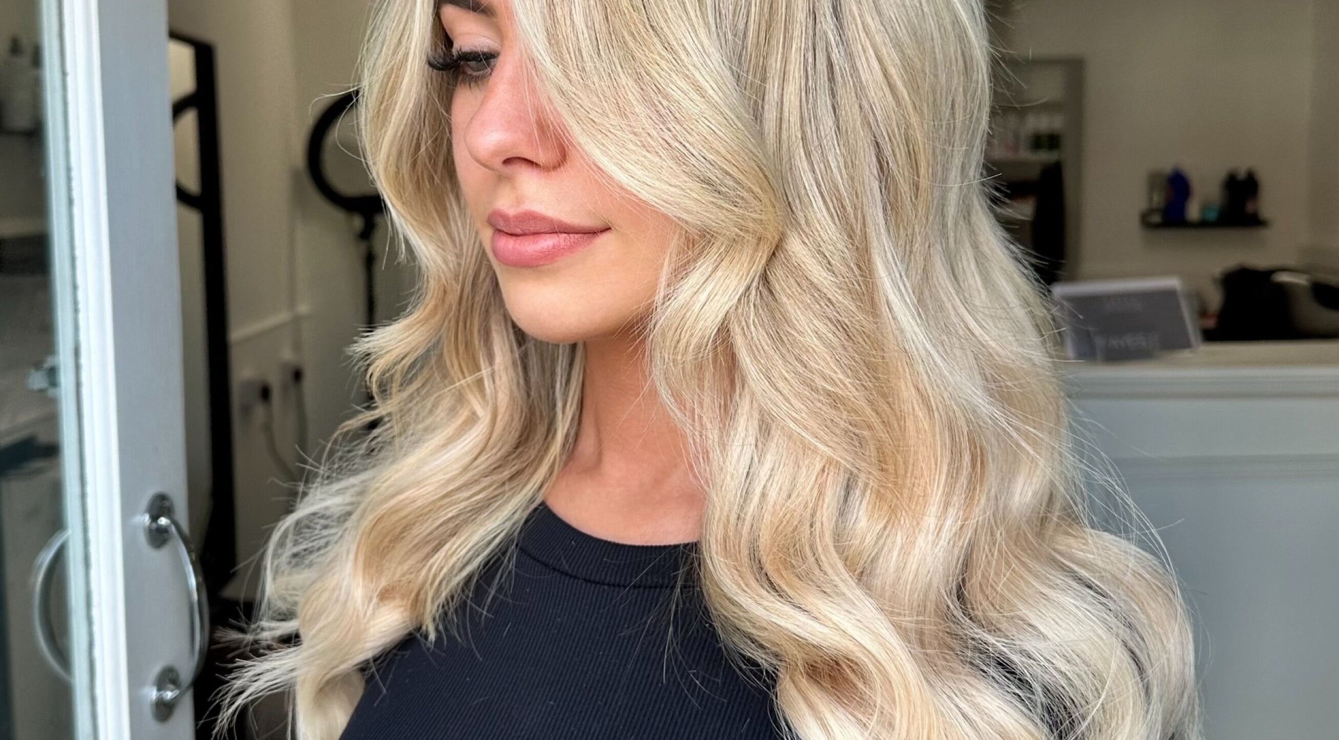 Elegant blonde waves styled at Hair by Tyler Alexandra, Basildon, England, GB.