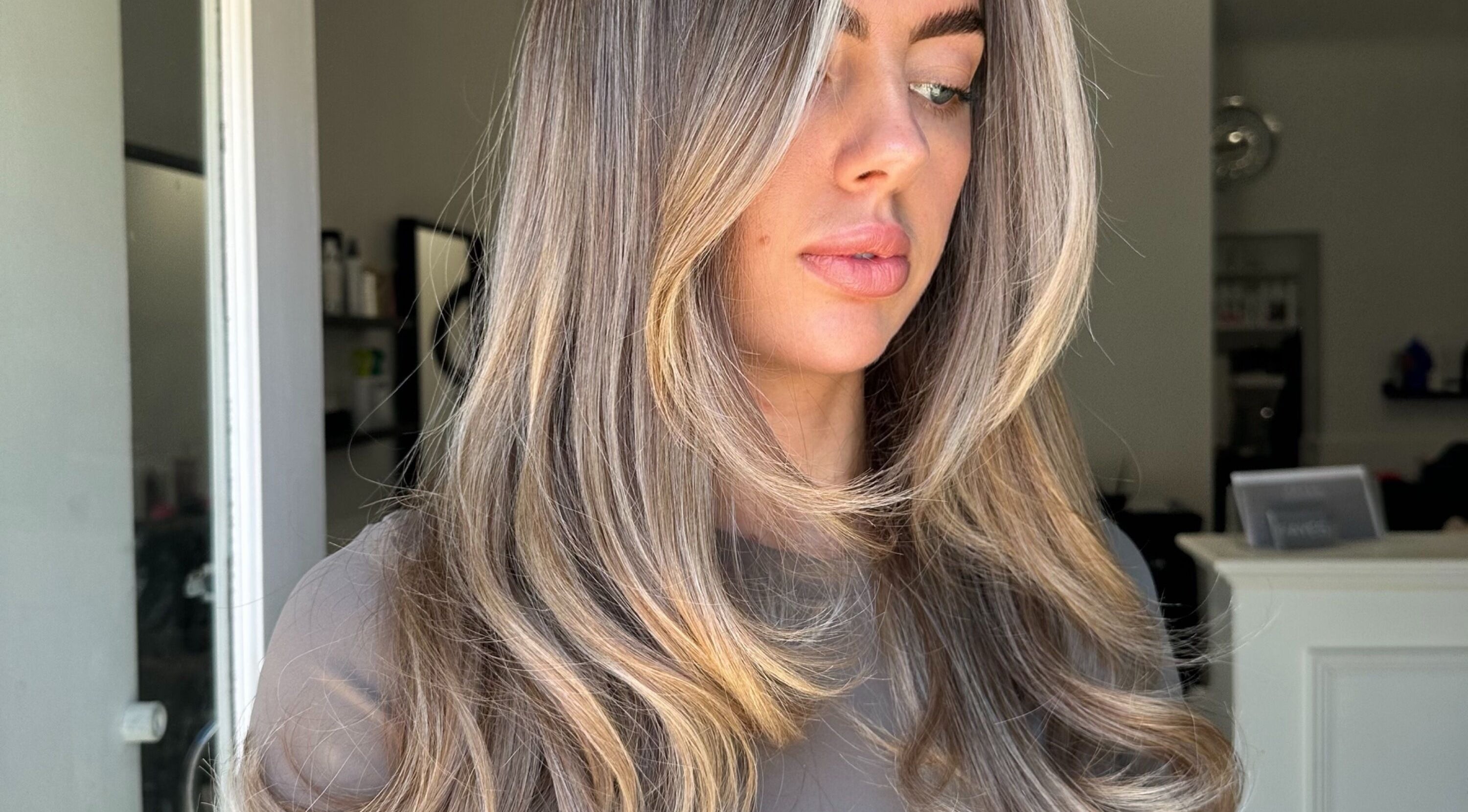 Woman with highlighted waves at Hair by Tyler Alexandra, Basildon, England, GB.