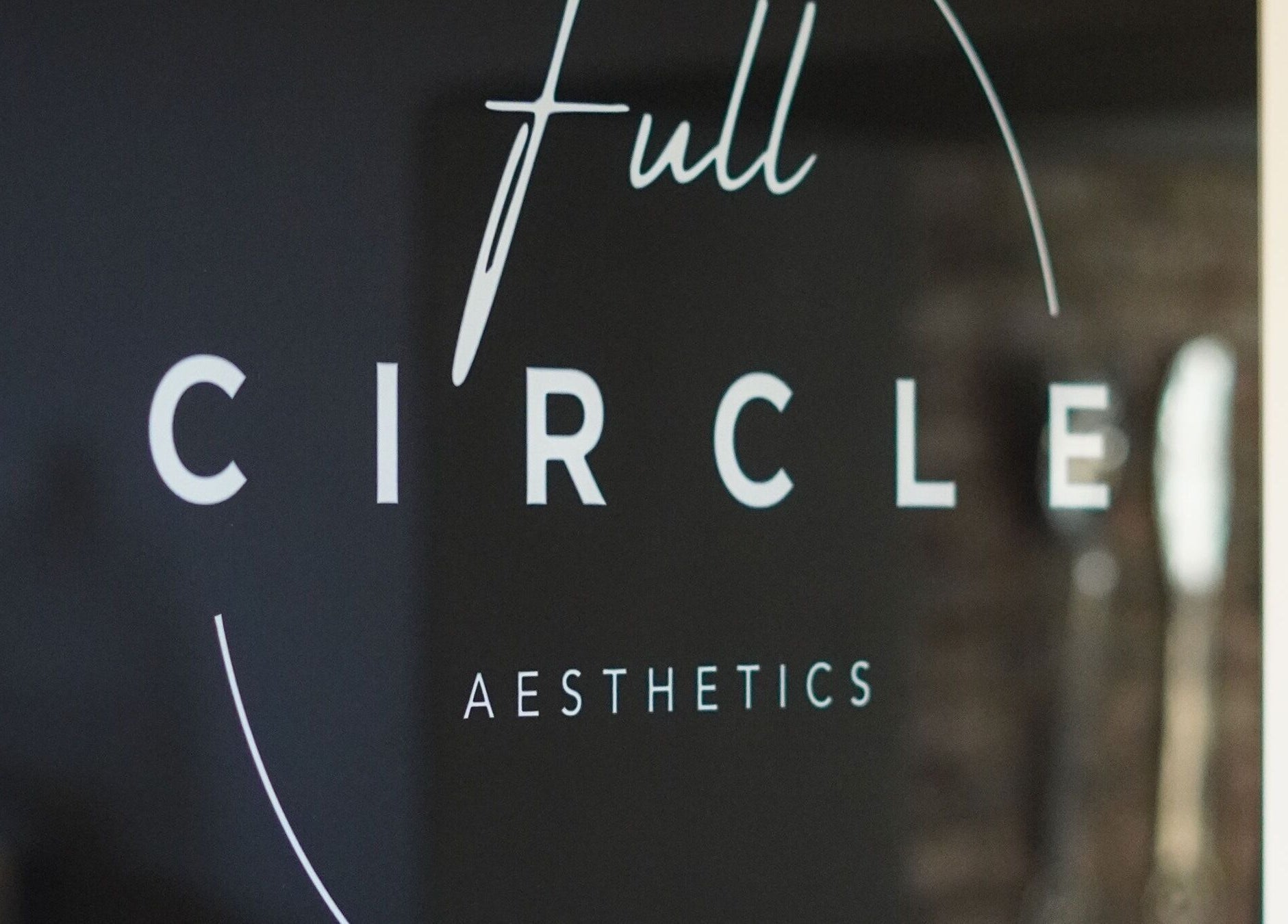 Full Circle Aesthetics logo at Pretoria, Gauteng, ZA entrance.