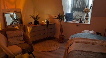 Relaxing spa room at The Alchemist Bunny, Glasgow, Scotland, GB with warm lighting and elegant decor.