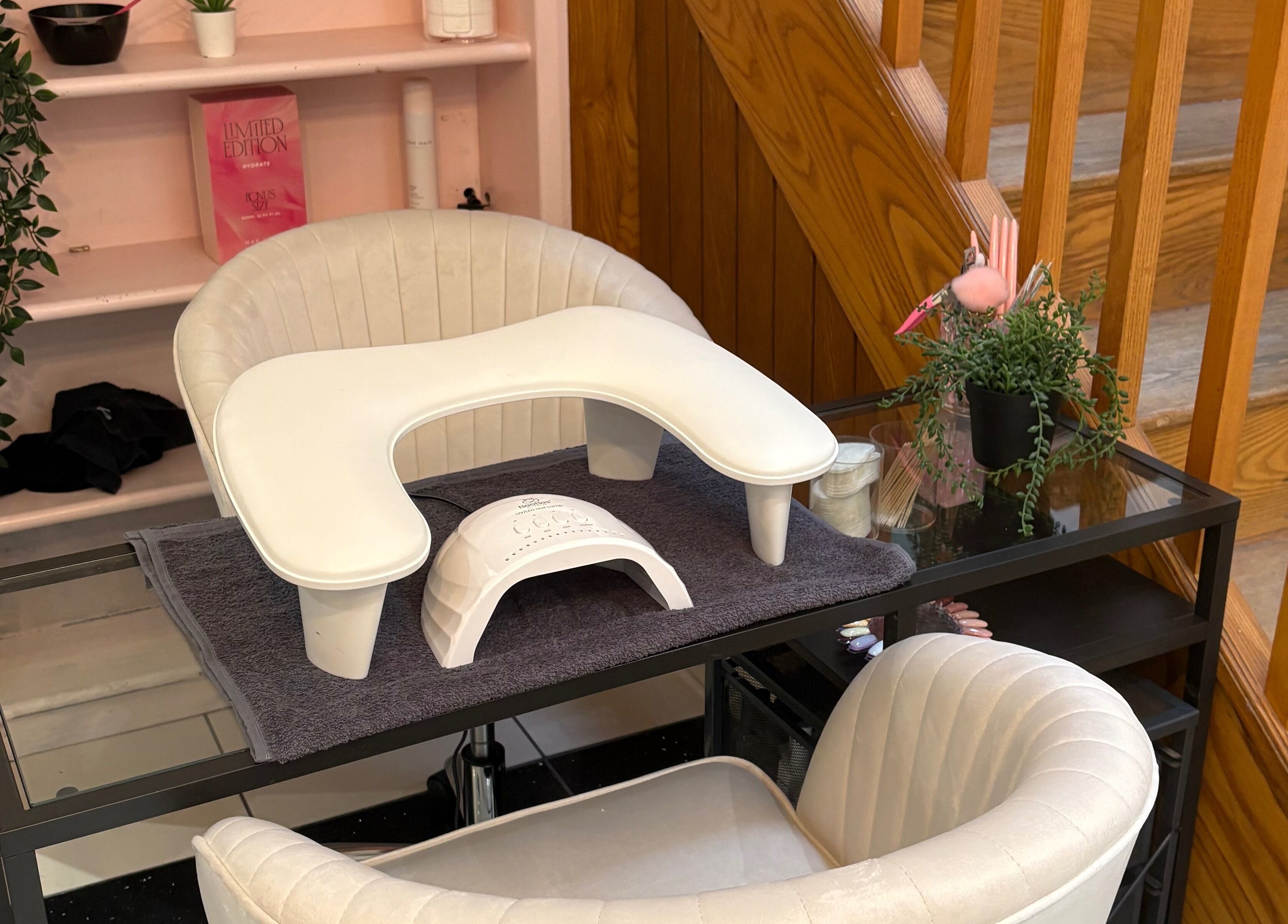 Nail station at Nails by Mia in Stratford-upon-avon, England, GB with modern decor and manicure setup.