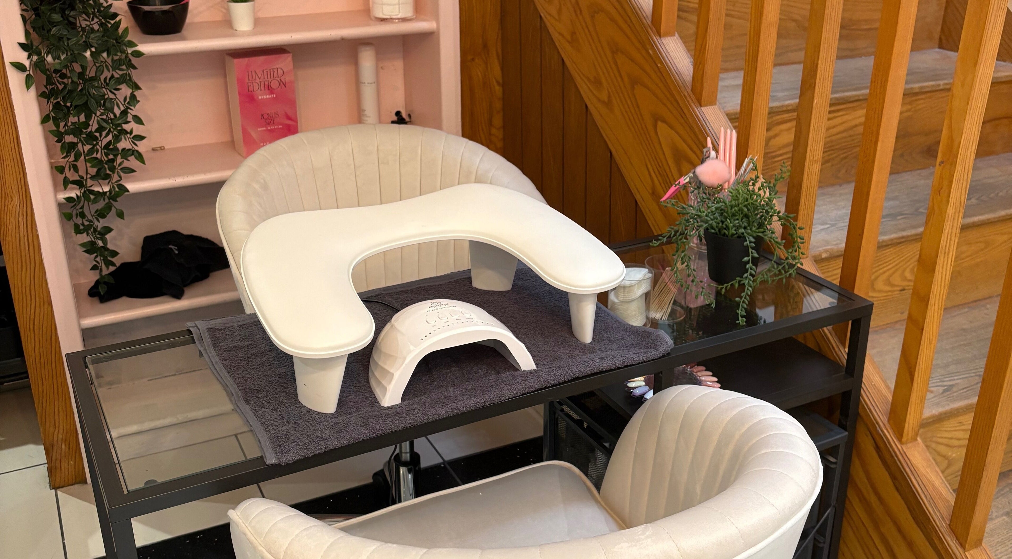 Nail station at Nails by Mia in Stratford-upon-avon, England, GB with modern decor and manicure setup.