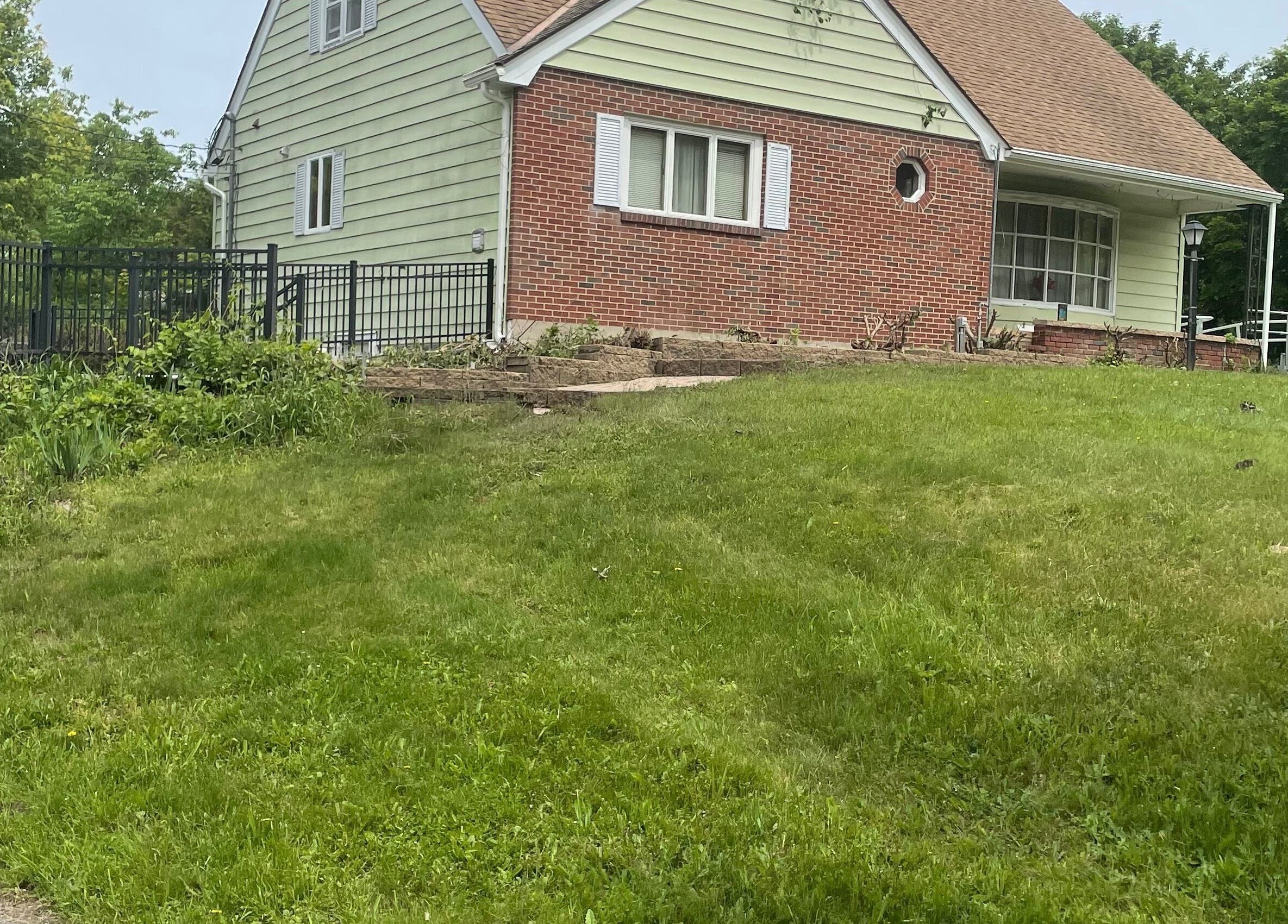 Exterior of Flawless Finish Salon in Otisville, New York, US surrounded by lush greenery.