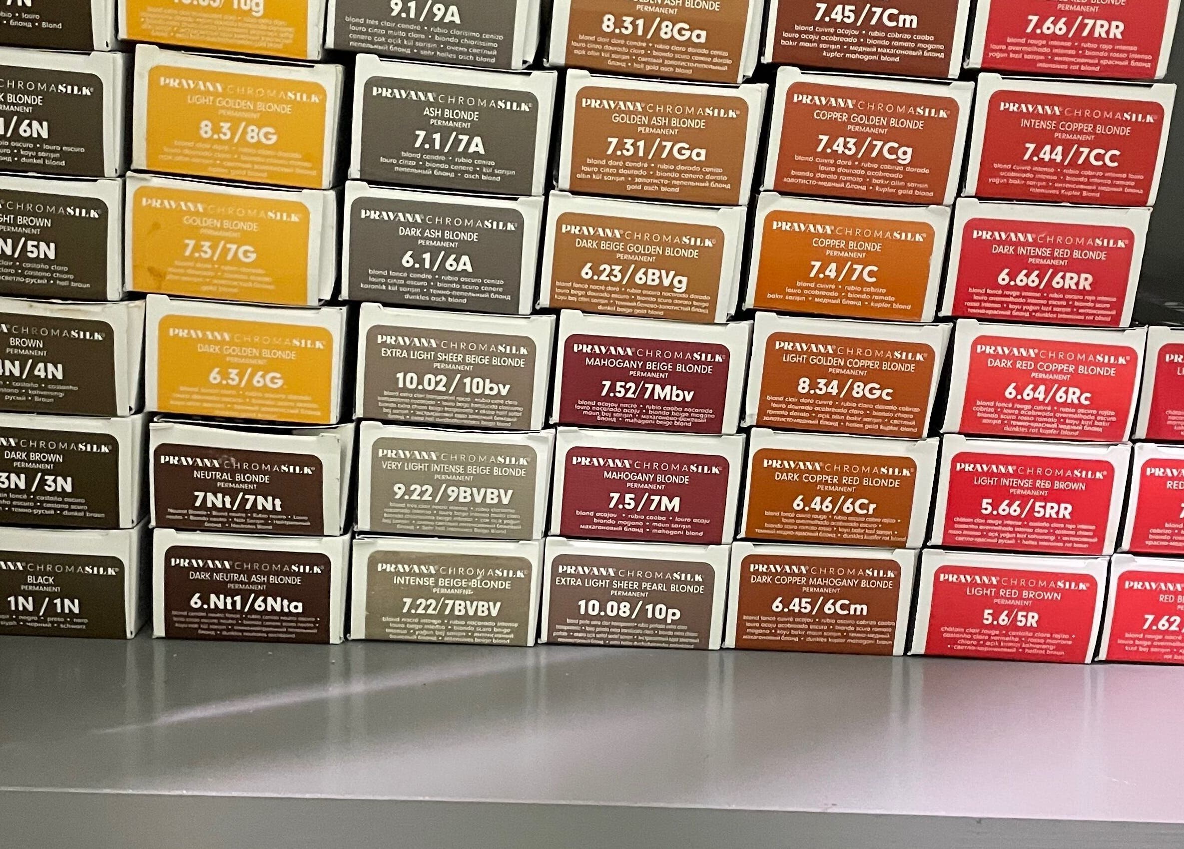 Diverse hair color boxes at Flawless Finish Salon, Otisville, New York, US, showcasing a variety of shades.