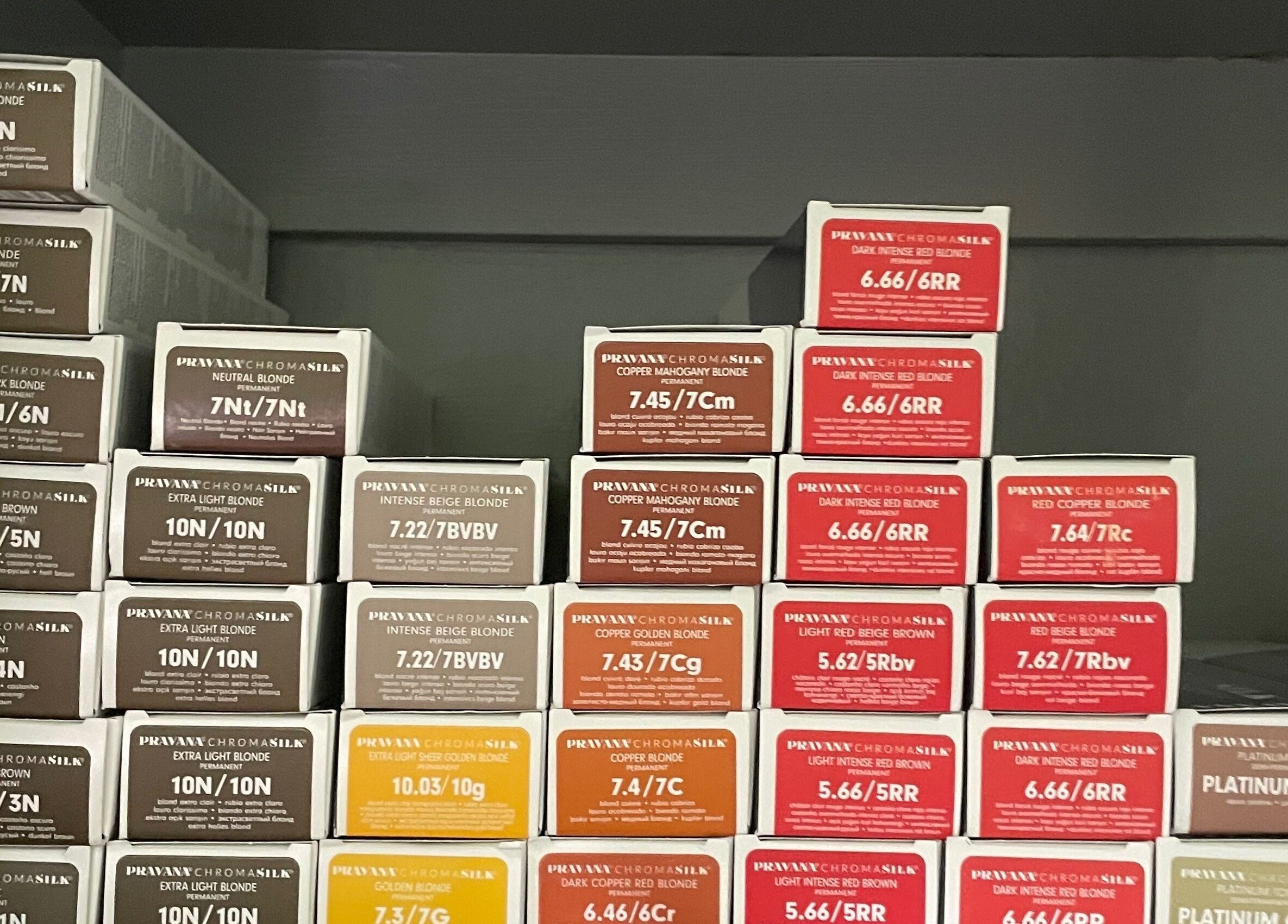 Colorful Pravana hair dye selection at Flawless Finish Salon, Otisville, New York, US.