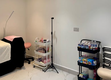 Inviting treatment room at TopLash Parlour, Rainham, England, GB, with modern decor and soothing ambiance.