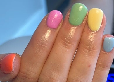 Vibrant multicolored manicure by NailsbyMichaela in Plymouth, England, GB, showcasing stunning pastel hues.
